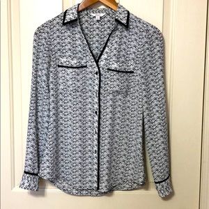 Candie’s black and white button-down top